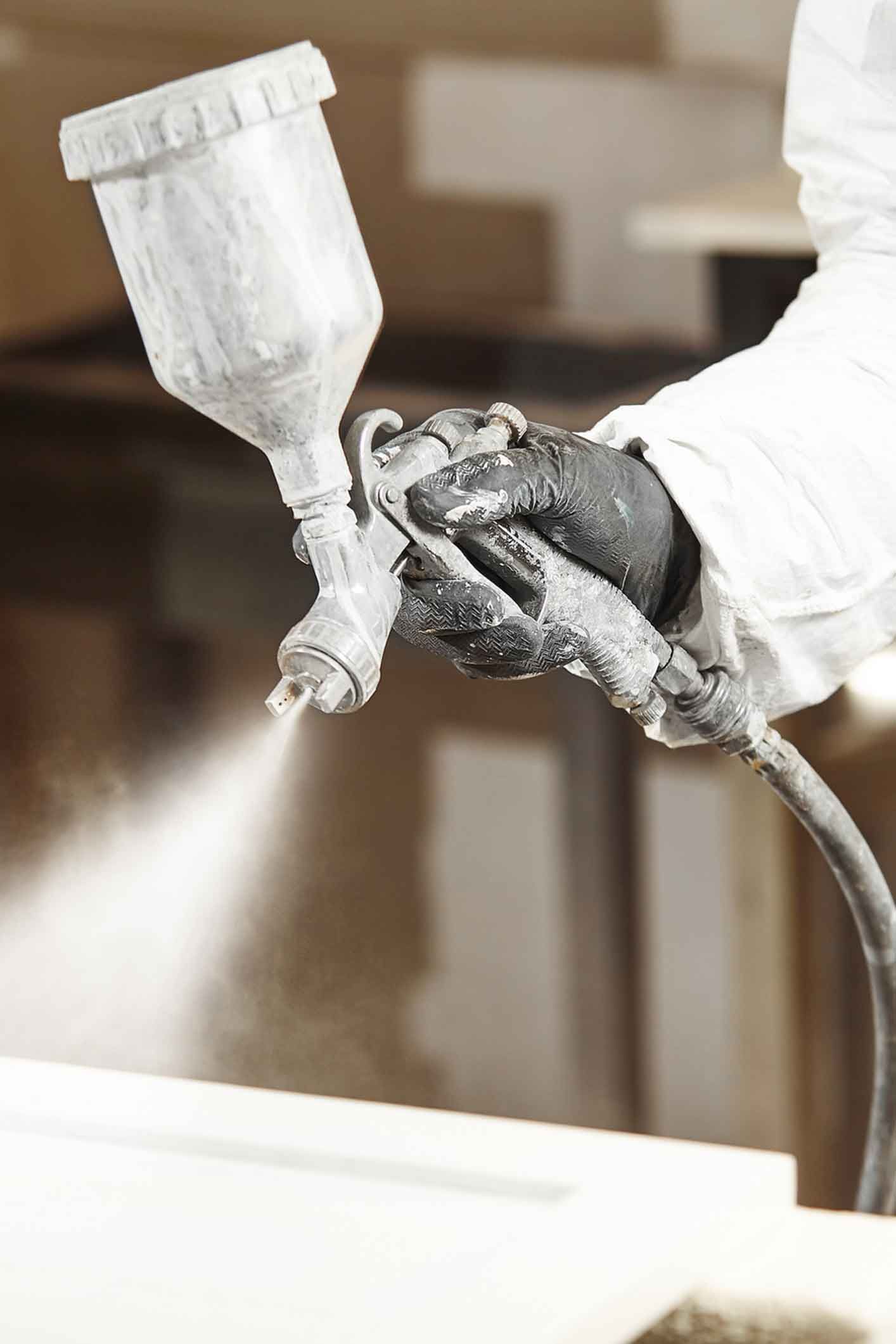 Mobile spray painting services for heavy machinery