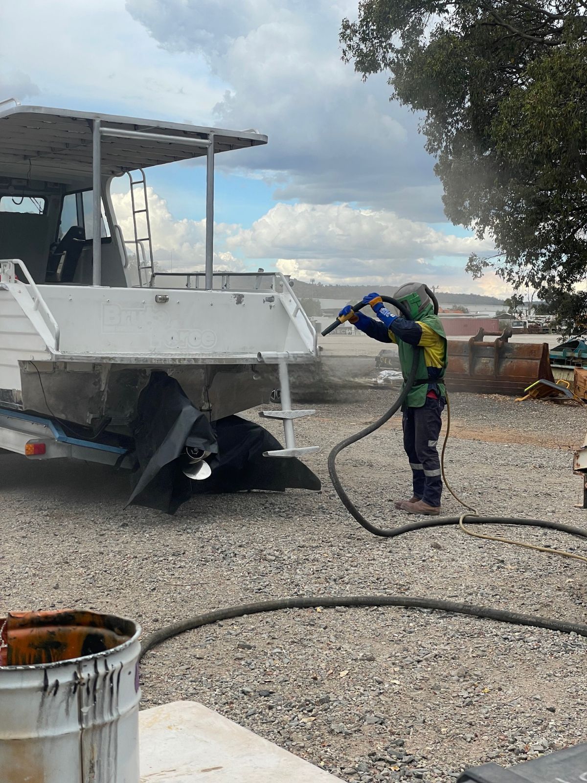 Mobile sandblasting specialists at work
